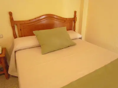 Cama o camas de una habitación en Hotel Venta del Pobre