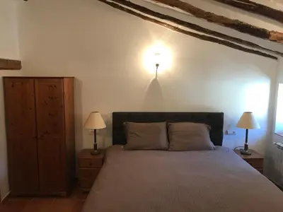Cama o camas de una habitación en B&B Cortijo El Ciruelo