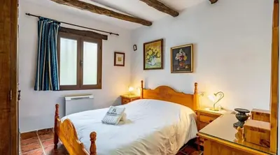 Cama o camas de una habitación en Spacious villa with mountain view and pool in Baza