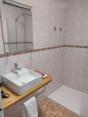 Un baño de H El Palmeral Playa