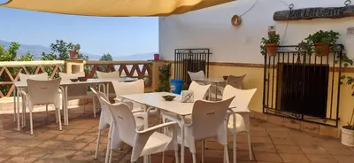 Un balcón o terraza de Pensión La Fuente