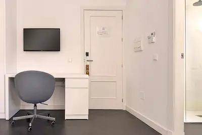Una televisión o centro de entretenimiento en Hostal Bajío