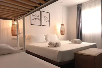 Cama o camas de una habitación en Hostal Bajío