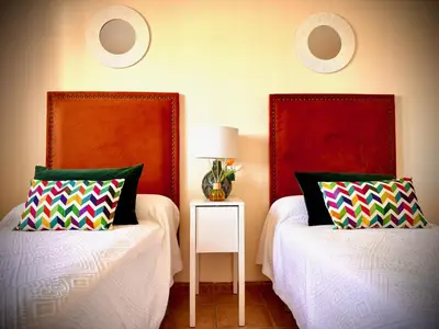 Cama o camas de una habitación en Hestía Vera Thalassa SPA Tu hogar lejos de casa