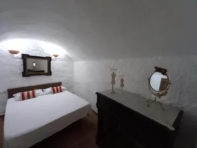 Cama o camas de una habitación en Cueva de Manuela