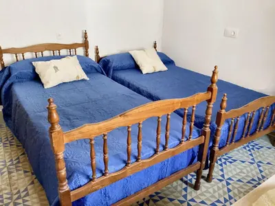 Cama o camas de una habitación en Charming Apartment in Albuñol, 90 m², Near Amenities