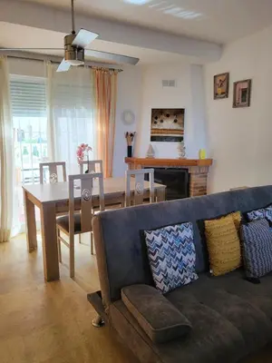 Zona de estar de LUJOSO ADOSADO de TRES HABITACIONES en VERA PLAYA A 200 METROS DEL MAR