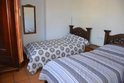 Cama o camas de una habitación en Villa Garcia - Old Reformed Cortijo