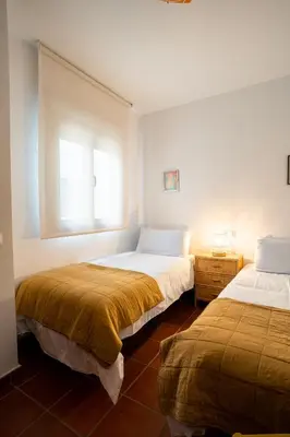 Cama o camas de una habitación en Trendy Homes Casa Nerida