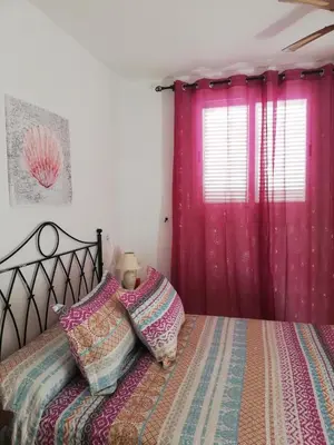 Cama o camas de una habitación en Apartamento Naturista en primera línea en Natura World!