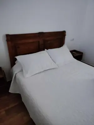 Cama o camas de una habitación en apartamento el molino con piscina privada