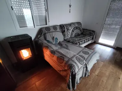 Zona de estar de apartamento el molino con piscina privada
