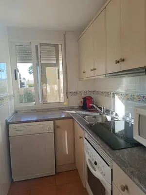 Una cocina o zona de cocina en Bahía de Vera Apartamento Luisa