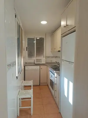 Una cocina o zona de cocina en Bahía de Vera Apartamento Luisa