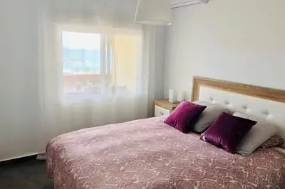 Cama o camas de una habitación en APARTAMENTO PRIMERA LINEA