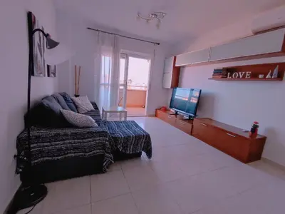 Una televisión o centro de entretenimiento en Apartamento Barlovento
