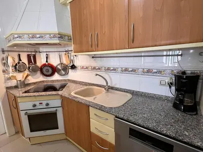 Una cocina o zona de cocina en Apartamento DELAMAR BAJEL46