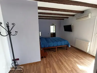 Cama o camas de una habitación en casa rural Sombra de la Atalaya