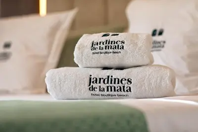 Cama o camas de una habitación en Jardines de la Mata Boutique Beach
