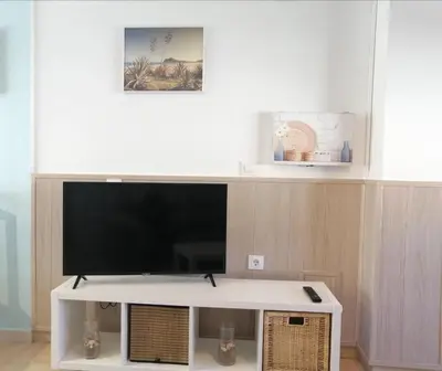 Una televisión o centro de entretenimiento en Casa Isabel