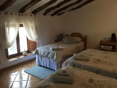 Cama o camas de una habitación en Cortijo Esquina B&B Guesthouse