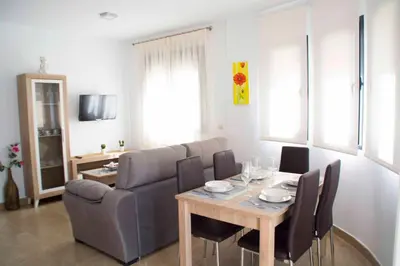 Zona de estar de Apartamentos EL POSAERO Juan Mariano
