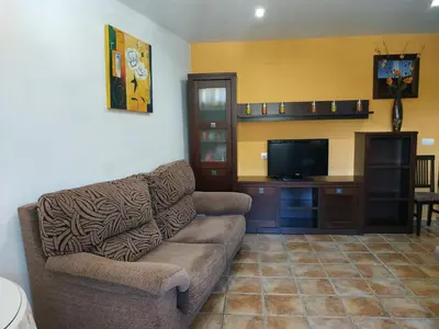 Una televisión o centro de entretenimiento en Casa rural el Mirador