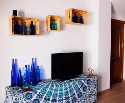 Una televisión o centro de entretenimiento en El Ático de La Casa Viva