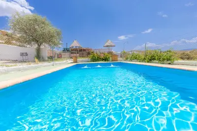 Piscina en o cerca de Alojamientos CUEVAS TIANA