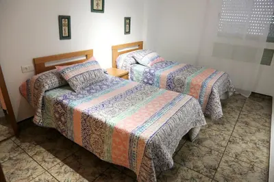 Cama o camas de una habitación en AMPLIO APTO en ROQUETAS