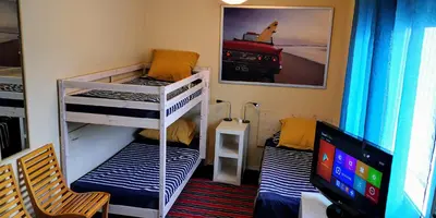 Cama o camas de una habitación en ¡ VAMOS A LA PLAYA !