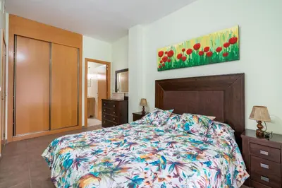Cama o camas de una habitación en El Rincón de Triana