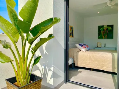 Cama o camas de una habitación en CHALET CON PISCINA PRIVADA EN LA URB. DE PUERTO REY
