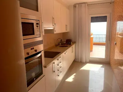 Una cocina o zona de cocina en Piso 3 dormitorios en Isla del Fraile Golf Resort con espectaculares vistas