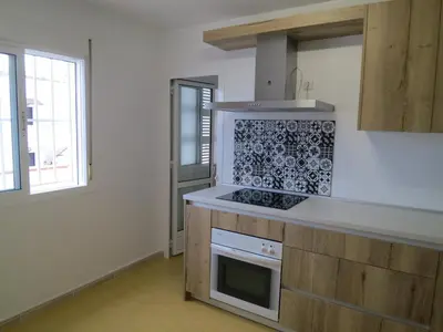 Una cocina o zona de cocina en ATICO Costa TOYO