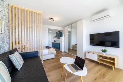 Una televisión o centro de entretenimiento en Trendy Homes Aguadulce Bay