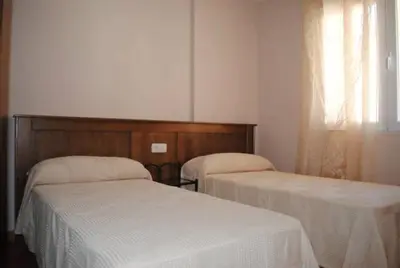 Cama o camas de una habitación en Alojamiento Rural Arucema