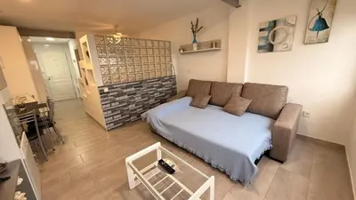 Cama o camas de una habitación en Alojamiento con vistas al mar