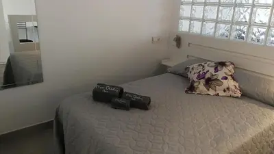 Cama o camas de una habitación en Alojamiento con vistas al mar
