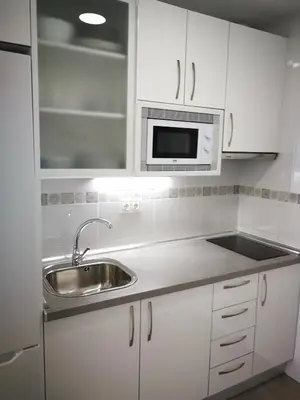 Una cocina o zona de cocina en Alojamiento con vistas al mar