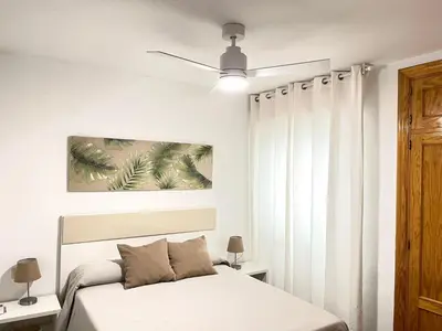 Cama o camas de una habitación en El Cachalote Feliz