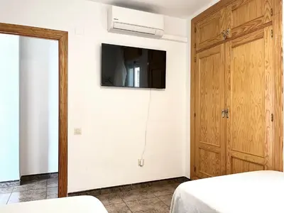 Cama o camas de una habitación en El Cachalote Feliz