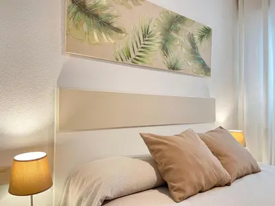 Cama o camas de una habitación en El Cachalote Feliz