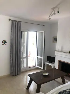 Una televisión o centro de entretenimiento en Casa la Parata