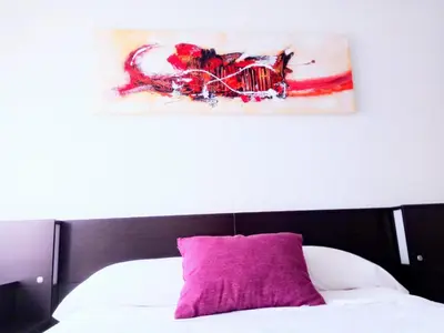 Cama o camas de una habitación en Apartamento San Juan Bosco