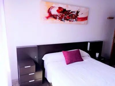 Cama o camas de una habitación en Apartamento San Juan Bosco