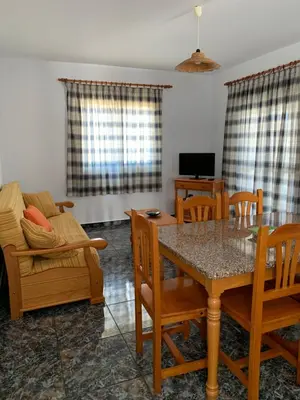 Una televisión o centro de entretenimiento en Vivienda Rural Manolo