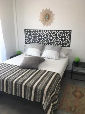 Cama o camas de una habitación en Casa Sol y Luz - casa rural