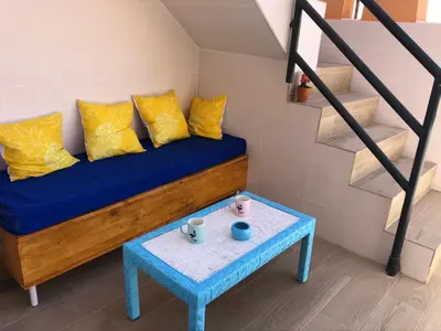 Zona de estar de Atico con piscina privada a 100m del mar