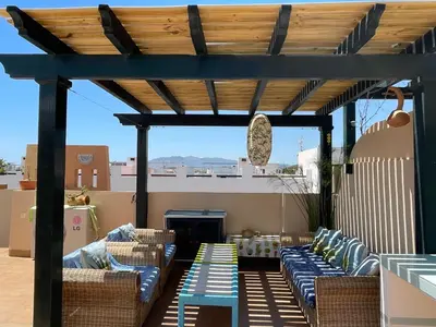 Zona de estar de Atico con piscina privada a 100m del mar